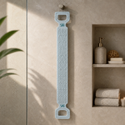 SAFI blue back scrubber hanging to dry in the shower